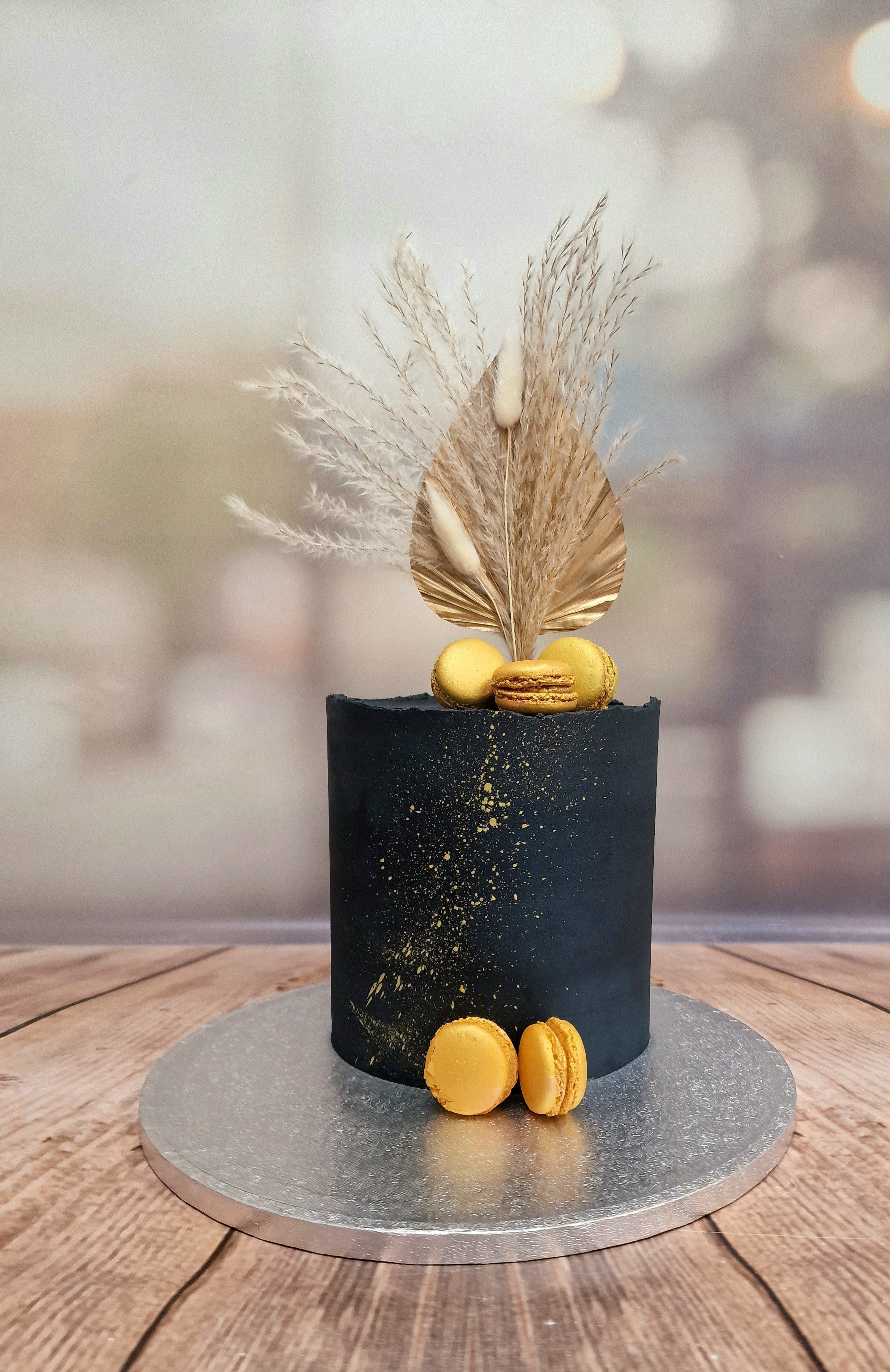 Black and Gold Macaron Buttercream Cake