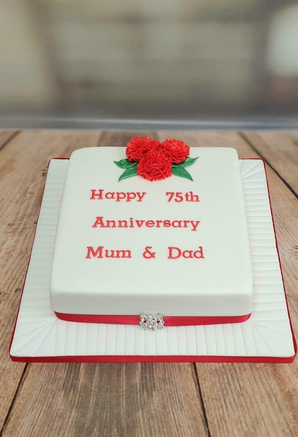Nice Square Anniversary Cake Decorated With Red And Bleu Edible Icing Roses  And Strawberries | Medcakes
